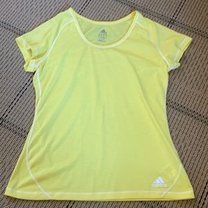Bright yellow adidas workout tee